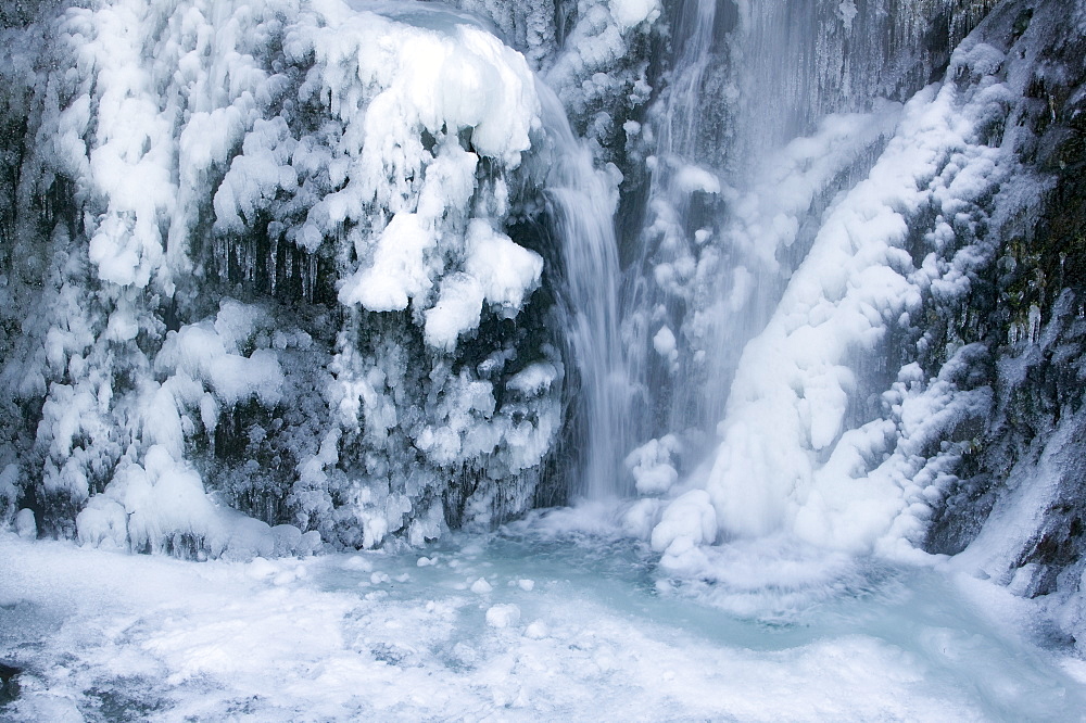 Fisherplace Ghyll above Thirlmere partially frozen in winter in the Lake District, Cumbria, England, United Kingdom, Europe