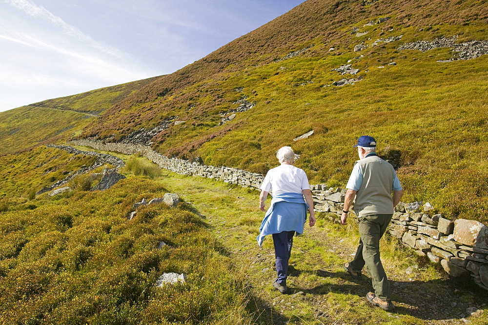 Walkers in an area of grouse moor only recently opened up under the CROW ACT in the Hareden Valley, Trough of Bowland, Lancashire, England, United Kingdom, Europe