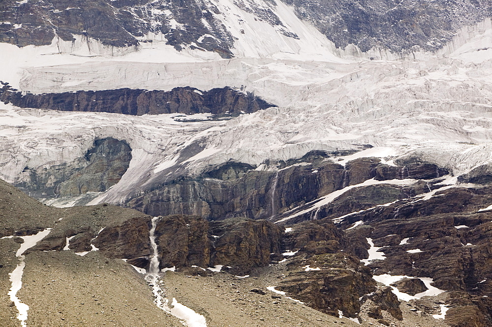 Melting glaciers on the north wall of the Matterhorn above Zermatt, Switzerland, Europe