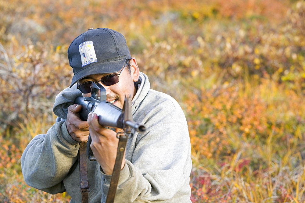 J J Weyouanna hunting Caribou on the tundra at the mouth of the Serpentine river near Shishmaref, a tiny island inhabited by around 600 Inuits, between Alaska and Siberia in the Chukchi Sea, United States of America, North America