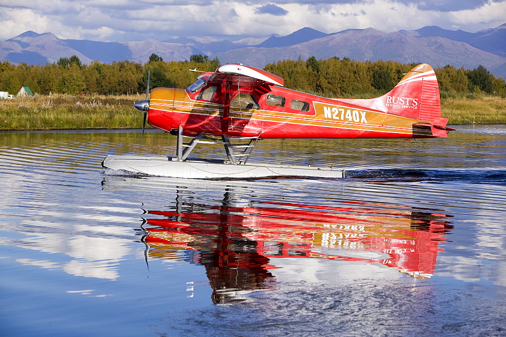 A float plane flying into Anchorage, Alaska, United States of America, North America