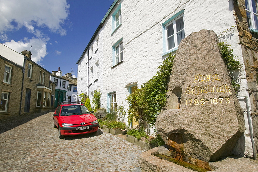 A memorial to Adam Sedgwick, the father of modern geology, in Dent, Yorkshire Dales National Park, Cumbria, England, United Kingdom, Europe