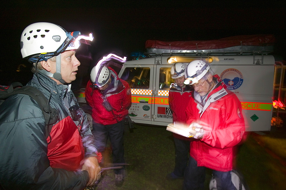 The Langdale Ambleside Mountain Rescue Team on a night search on Crinkle Crags in the Lake District, Cumbria, England, United Kingdom, Europe