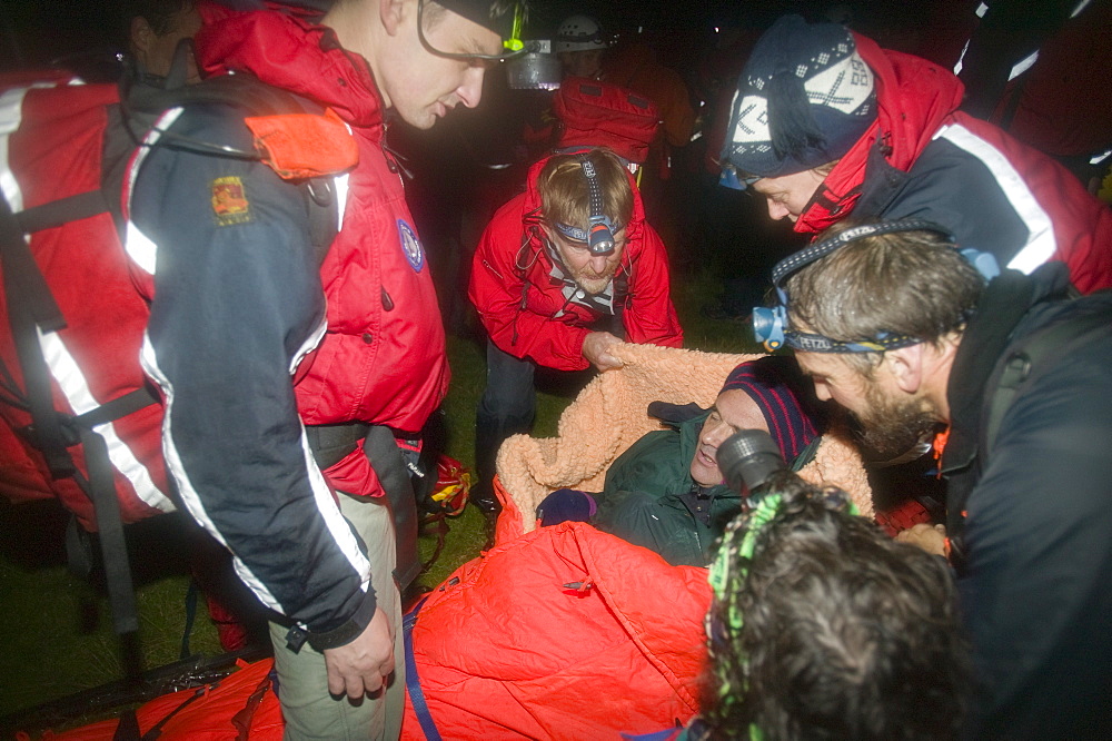 The Langdale Ambleside Mountain Rescue Team on a night search on Crinkle Crags in the Lake District, Cumbria, England, United Kingdom, Europe