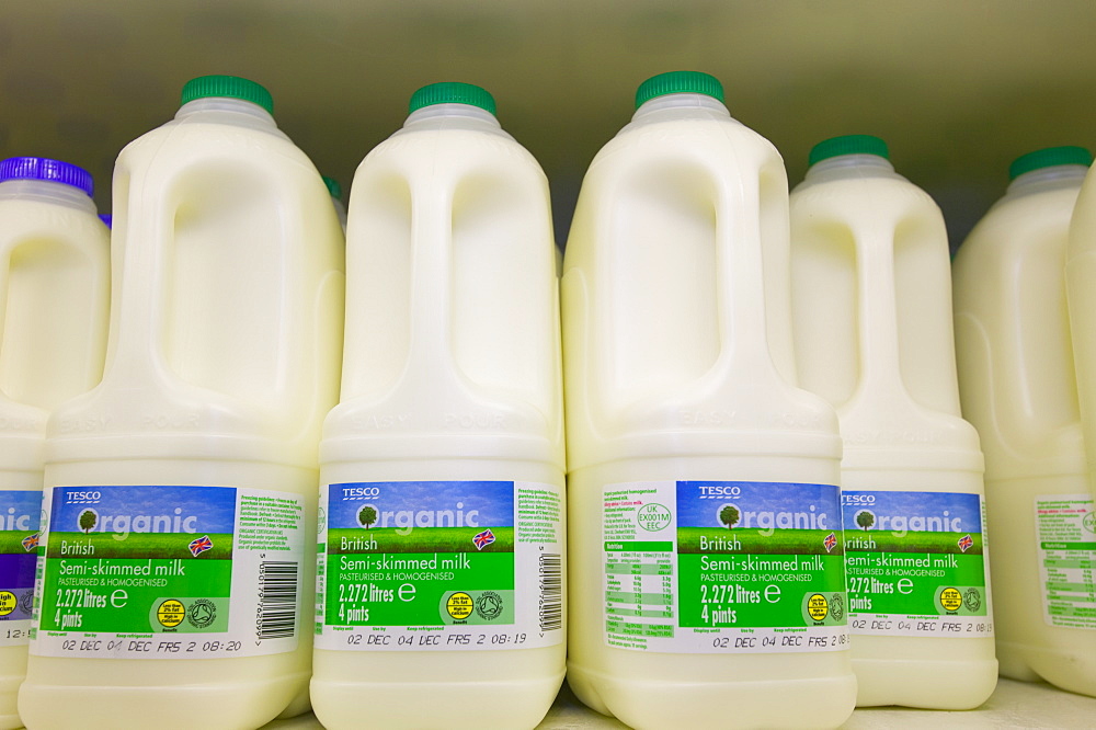 Organic milk in a Tesco supermarket in Carlisle, Cumbria, England, United Kingdom, Europe