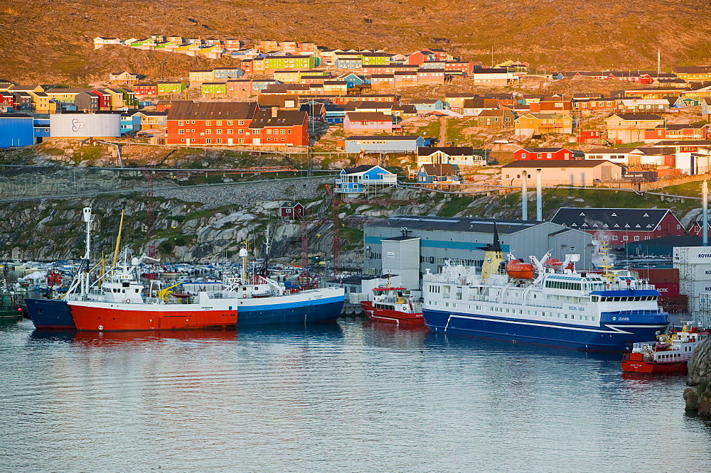 The harbour and colourful houses in Ilulissat in the midnight sun on Greenland, Polar Regions