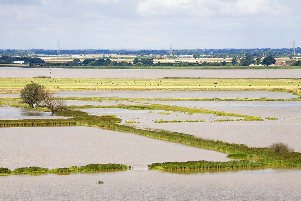 The Breach at Alkborough created in the sea defences to allow sea water to flood agricultural land and create a wetland for wildlife, Humber Estuary, Humberside, England, United Kingdom, Europe