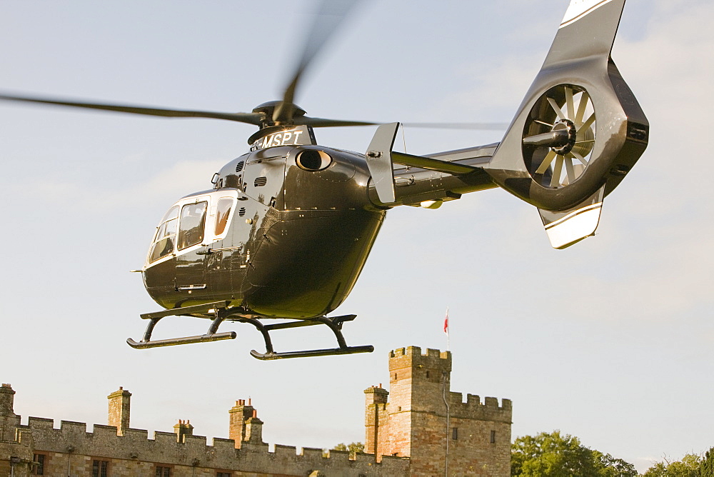 A private helicopter arriving at Narworth Castle in North Cumbria, England, United Kingdom, Europe