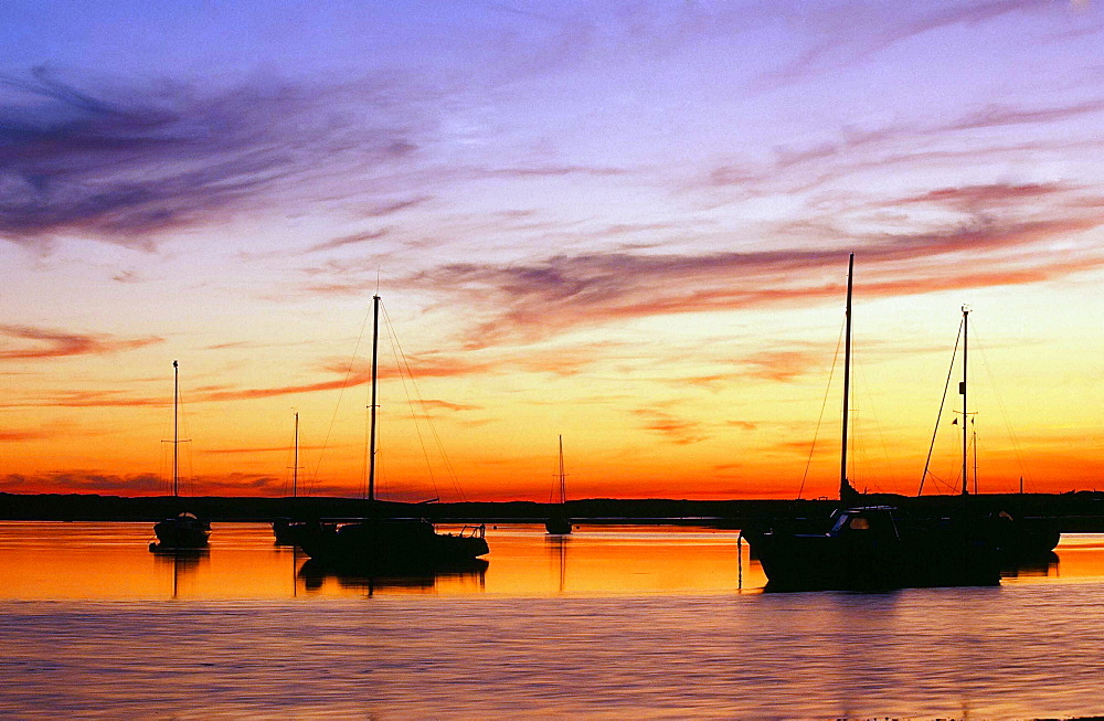 Sailing boats at sunset in Ravenglass, Cumbria, England, United Kingdom, Europe