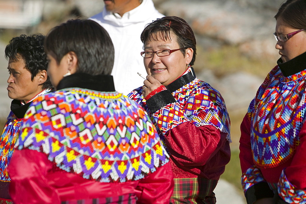 Inuit women wearing traditional Greenlandic national costume (Kalaallisuut) in Ilulissat on Greenland, Polar Regions