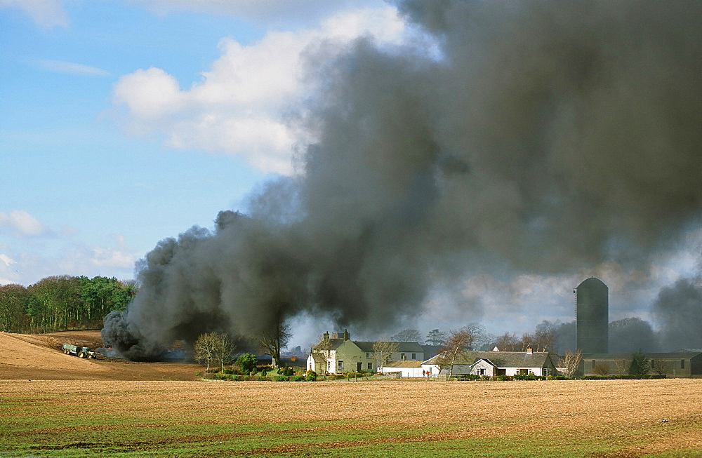 A funeral pyre burning infected animals with Foot and Mouth Disease near Longtown in Cumbria, England, United Kingdom, Europe