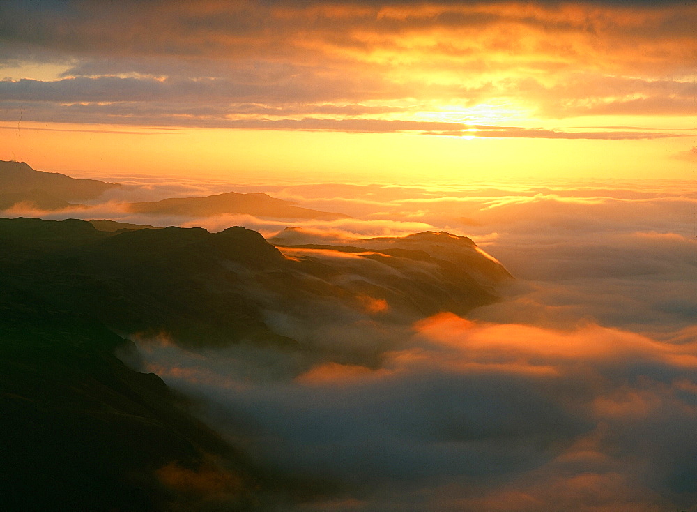 A temperature inversion at sunset over Eskdale in the Lake District National Park, Cumbria, England, United Kingdom, Europe