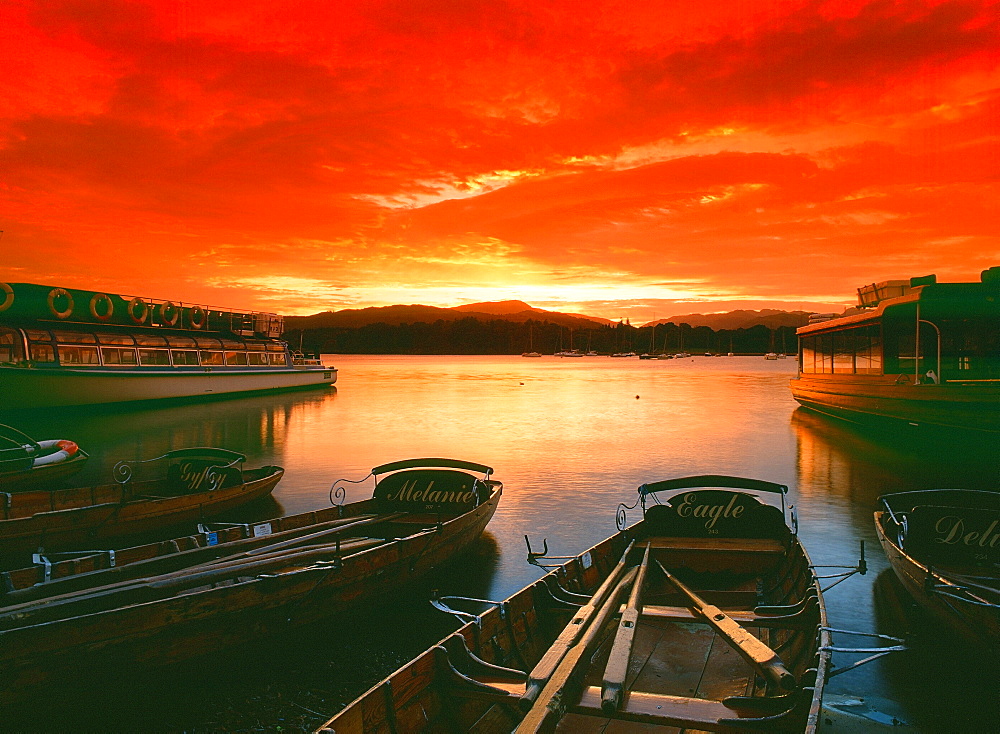 Lake Windermere and rowing boats at sunset in the Lake District National Park, Cumbria, England, United Kingdom, Europe