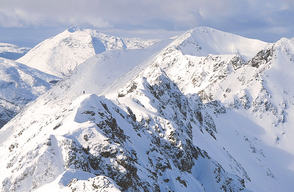 A climber on the Aonach Eagach ridge in Scotland, United Kingdom, Europe