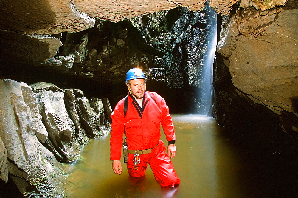 A caver in the Yorkshire Dales, Yorkshire, England, United Kingdom, Europe