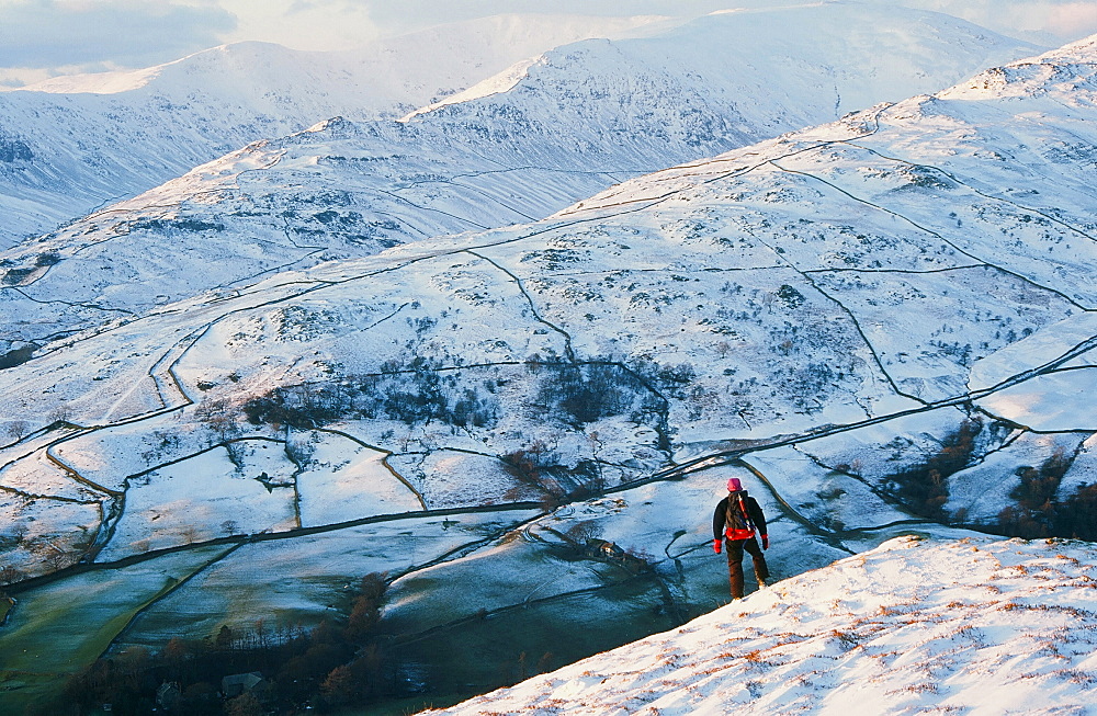 A man on Red Screes in the Lake District National Park, Cumbria, England, United Kingdom, Europe