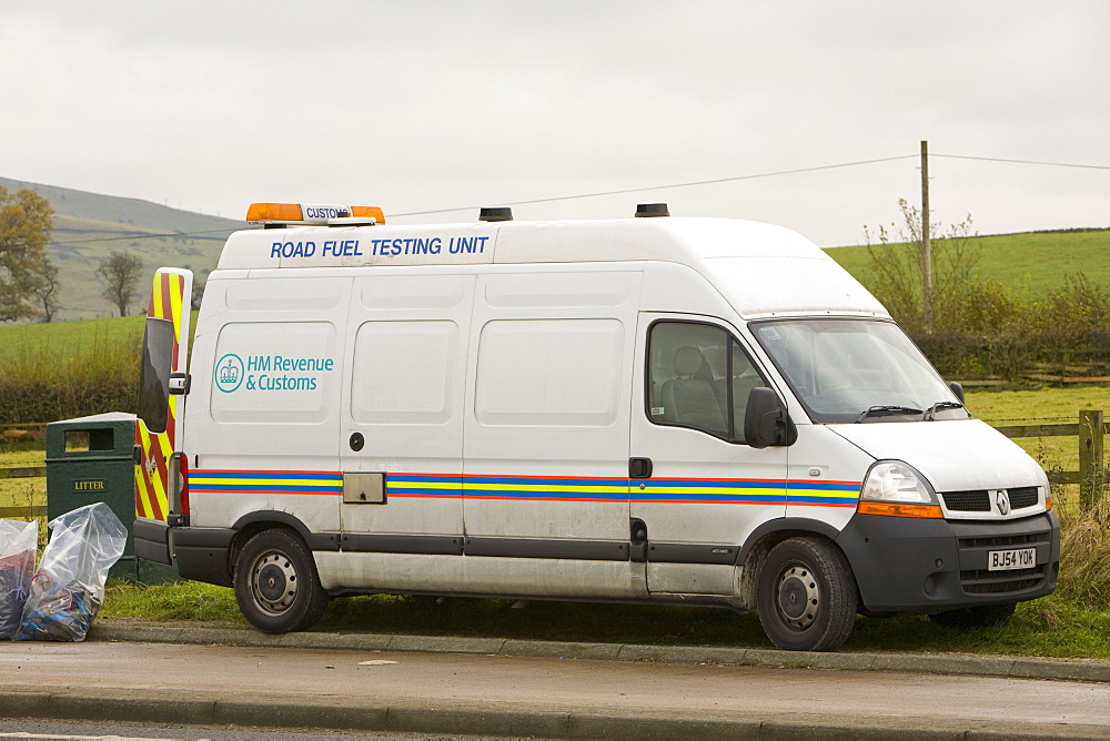 HM Revenue and Customs stopping vehicles and dipping petrol tanks to test for illegal use of red diesel to avoid paying duty, near Skipton, Yorkshire, England, United Kingdom, Europe