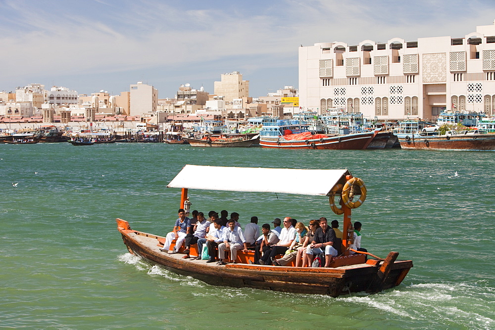 Dhows and water taxis on the Dubai Creek in Dubai, United Arab Emirates, Middle East