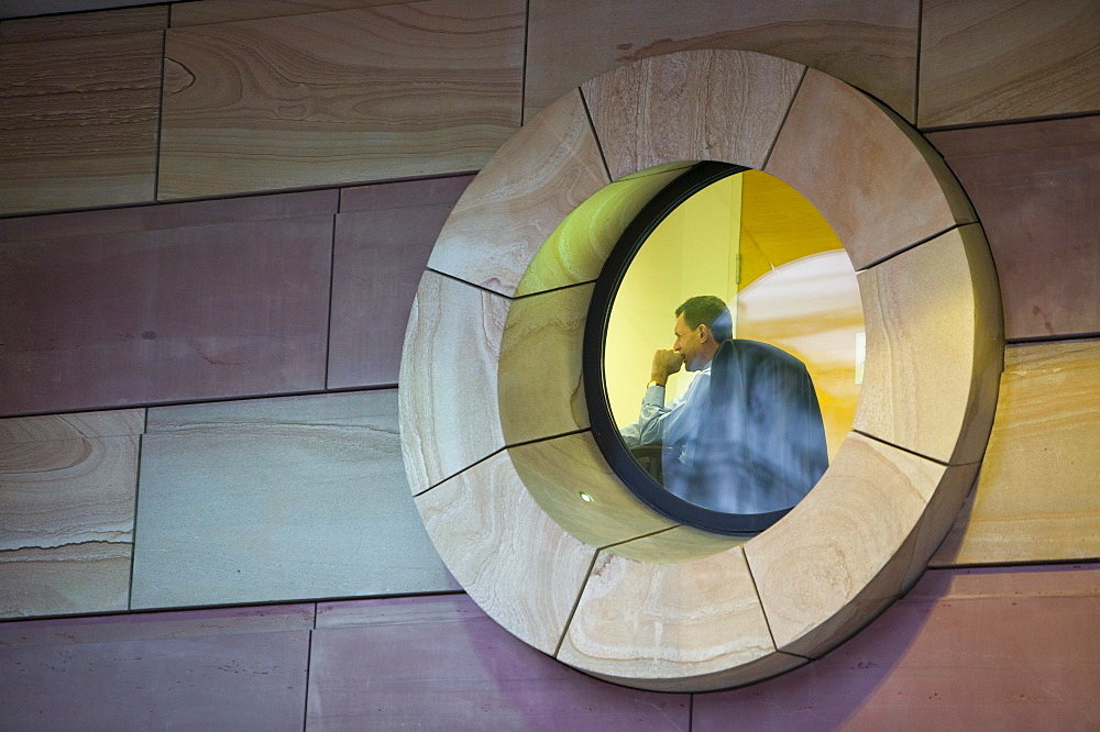 A business man at work at Regus in London, England, United Kingdom, Europe