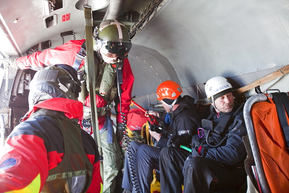 A Navy Sea King helicopter crew help to evacuate an injured walker in the Lake District, Cumbria, England, United Kingdom, Europe