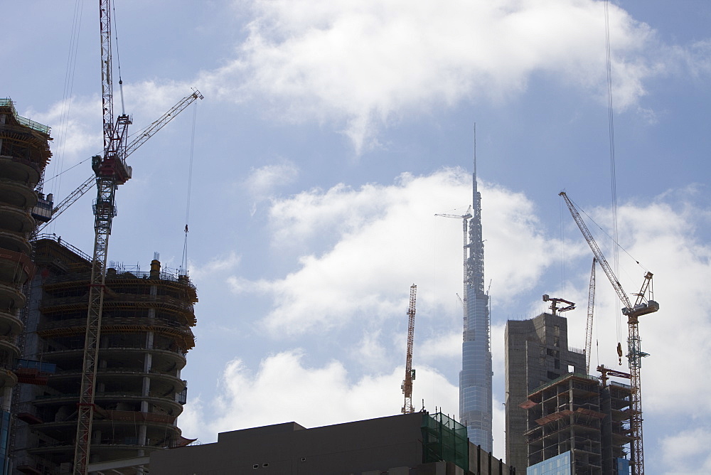 A construction site in Dubai looking towards the worlds tallest building the Burj Dubai, United Arab Emirates, Middle East