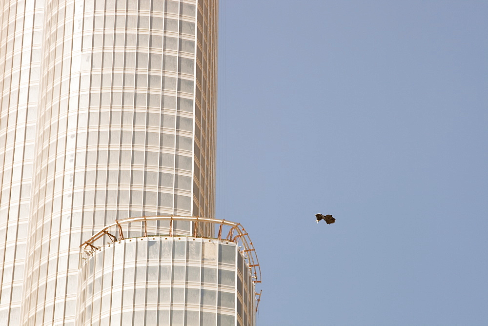 Rubbish floating past the Burj Dubai, the world's tallest building in Dubai, United Arab Emirates, Middle East