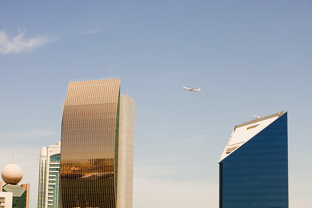 Plane taking off from Dubai airport over Dubai Creek, United Arab Emirates, Middle East