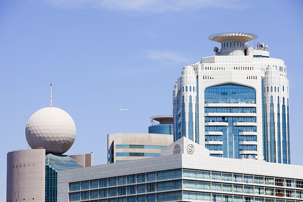 Plane taking off from Dubai airport over Dubai Creek, United Arab Emirates, Middle East