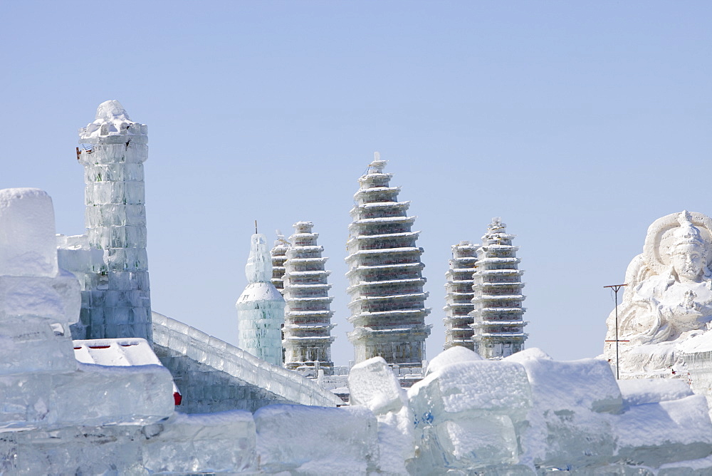 Pagodas built with blocks of ice from the Songhue river in Harbin, Heilongjiang Province, Northern China, Asia