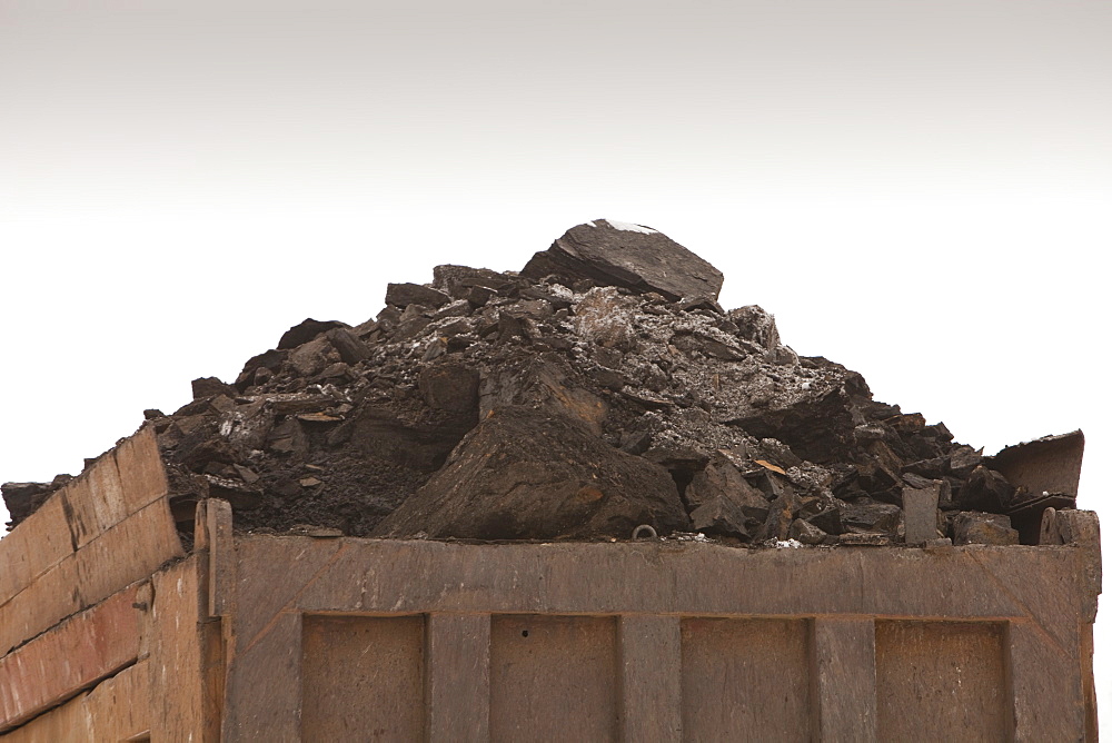 Trucks carrying highly polluting low grade coal from an open cast coal mine near Heihe, Heilongjiang, China, Asia