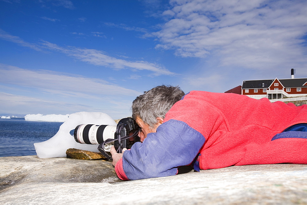 Ashley Cooper from Global Warming Images photographs the Jacobshavn glacier (Sermeq Kujalleq), Greenland, Polar Regions