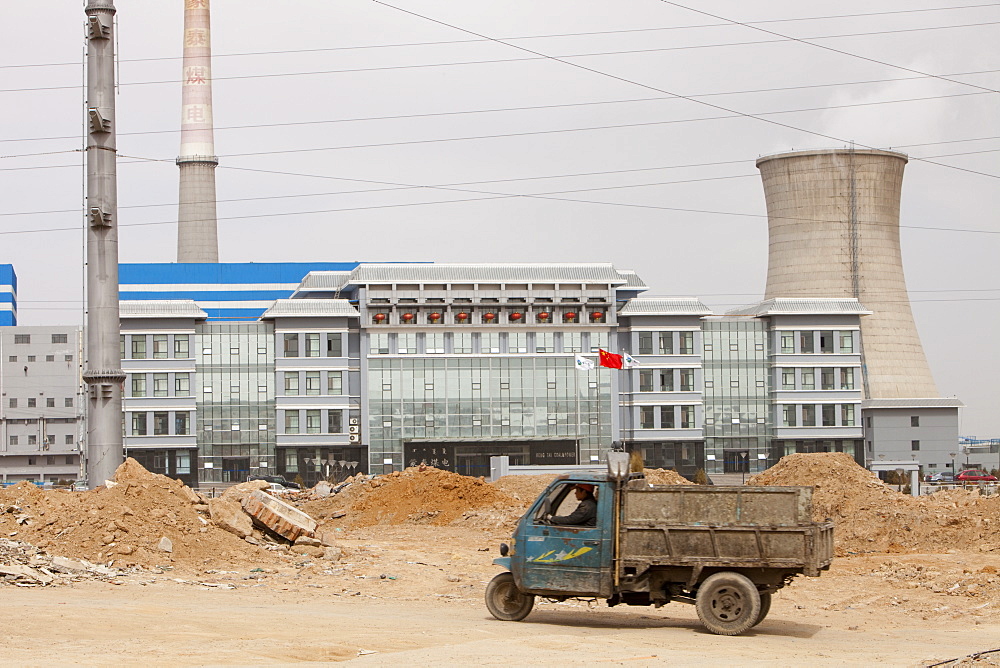 Lorries haul coal to a coal fired power plant in Dongsheng, Inner Mongolia, China, Asia