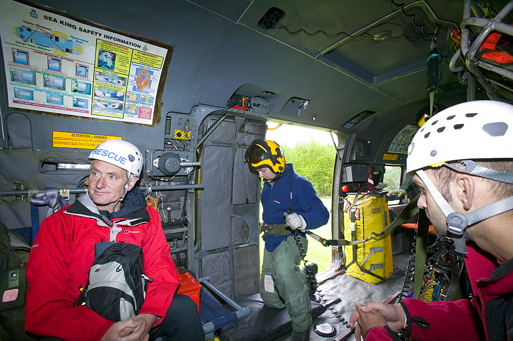 Members of a mountain rescue team onboard an RAF Sea King Helicopter, Lake District, Cumbria, England, United Kingdom, Europe