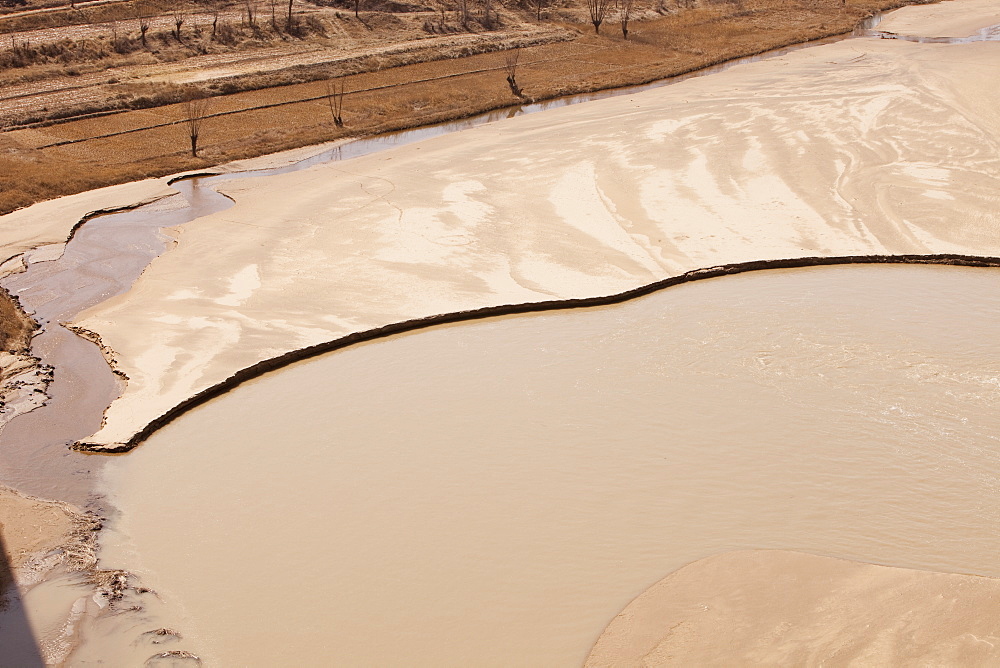 A critically low river in Shanxi province, China, Asia