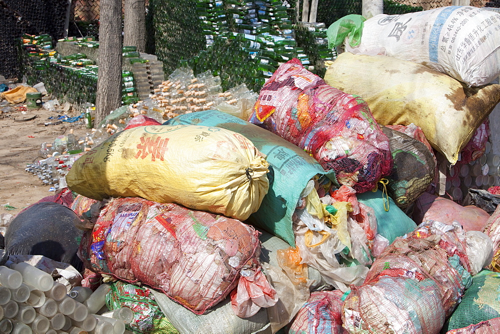 A family near Xian city make their living from recycling bottles and plastic, China, Asia