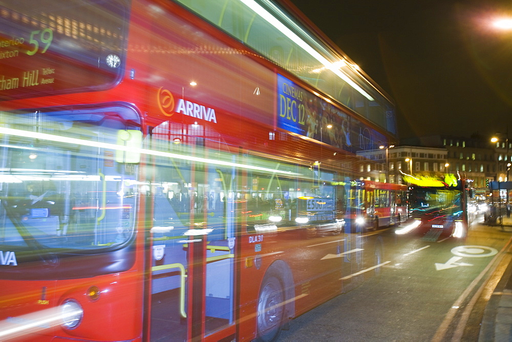 A London Bus at night outside Kings Cross, London, England, United Kingdom, Europe