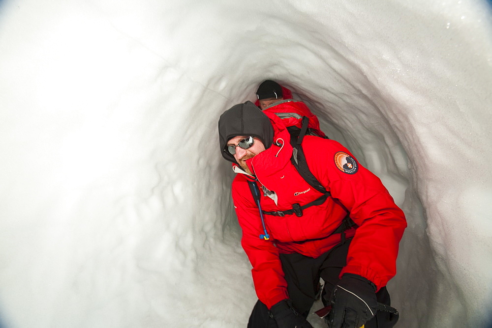 A group of mountaineers building snow holes on Cairngorm in the Cairngorm National Park in Scotland, United Kingdom, Europe