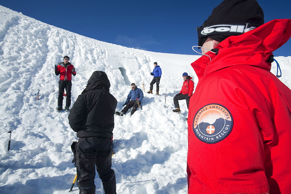 A group of mountaineers building snow holes on Cairngorm in the Cairngorm National Park in Scotland, United Kingdom, Europe