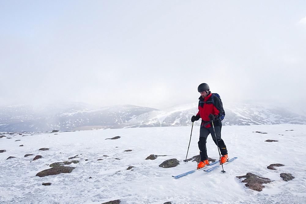 Ski mountaineers on the summit of Cairngorm in Scotland, United Kingdom, Europe