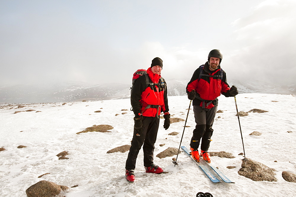 Ski mountaineers on the summit of Cairngorm in Scotland, United Kingdom, Europe