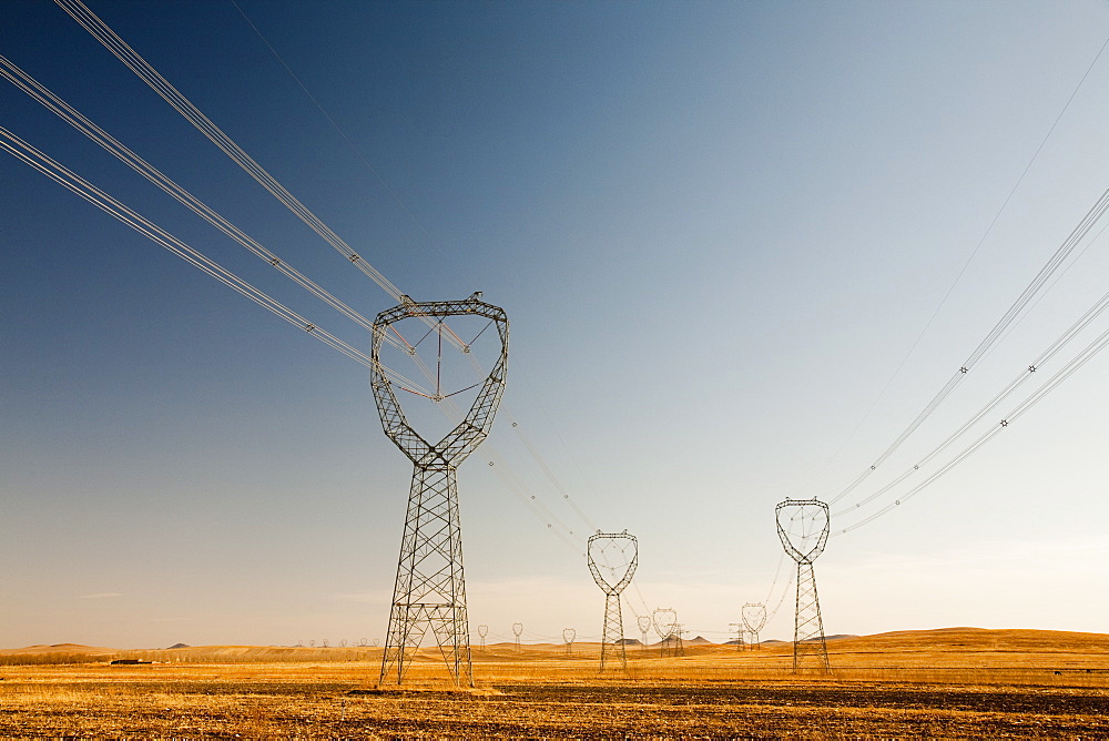 Electricity pylons march across Inner Mongolia in Northern China, Asia