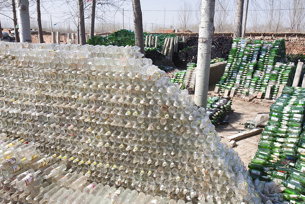 A family near Xian city make their living from recycling bottles and plastic, China, Asia