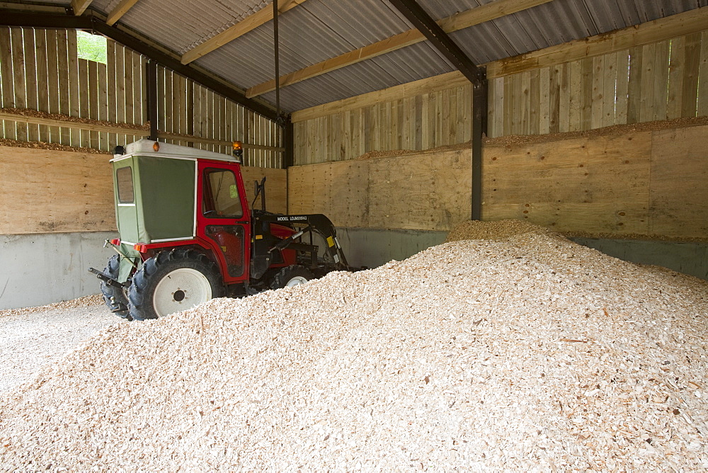 The woodchip store for a biofuel boiler in the grounds of the Langdale Timeshare in the Lake District, Cumbria, England, United Kingdom, Europe