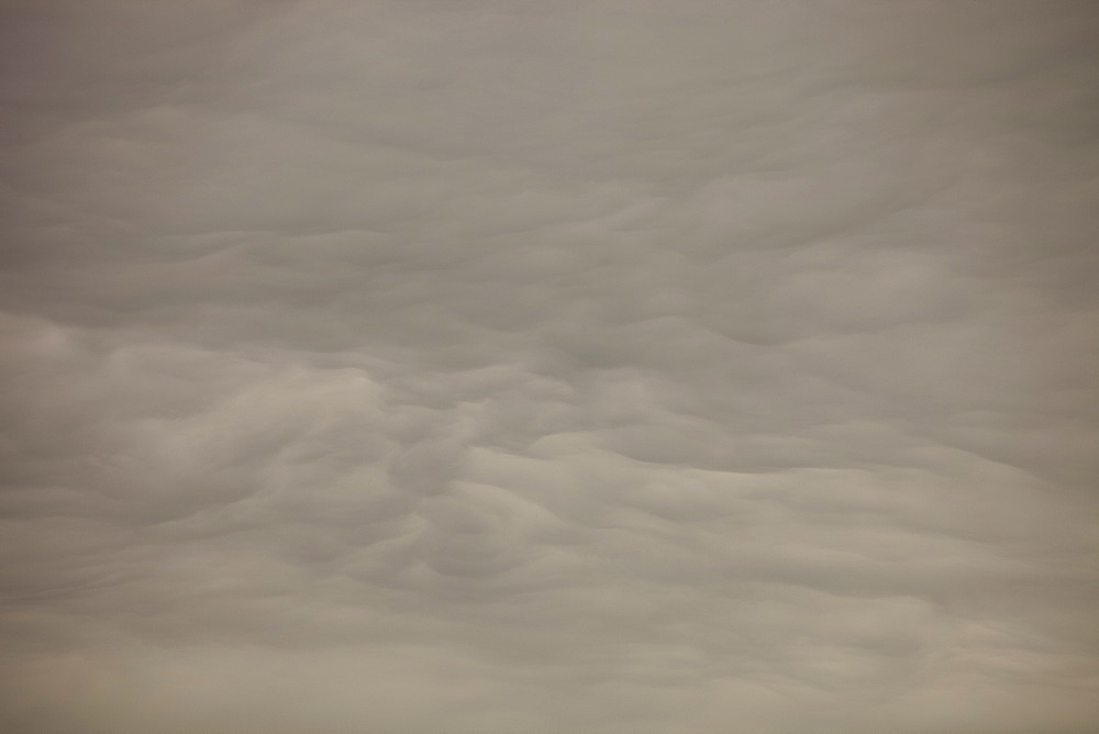 Patterns in cloud on an occluded front over the Lake District hills in Ambleside, Cumbria, England, United Kingdom, Europe