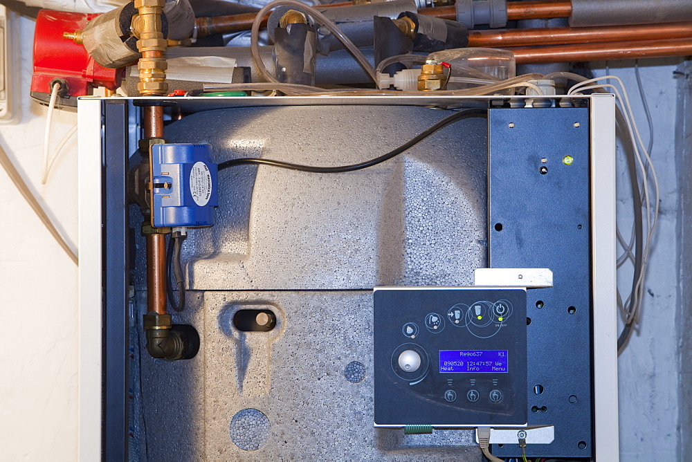 A ground source heat pump with pipes coming up from 55 metres down in a house in Ambleside, Cumbria,, England, United Kingdom, Europe