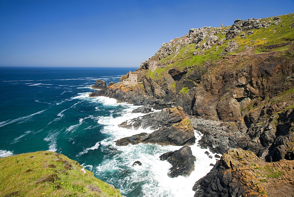 The famous Crown tin mine at Bottallack on the North Cornish coast, now abandoned but its old shafts extend way out below the sea, Cornwall, England, United Kingdom, Europe