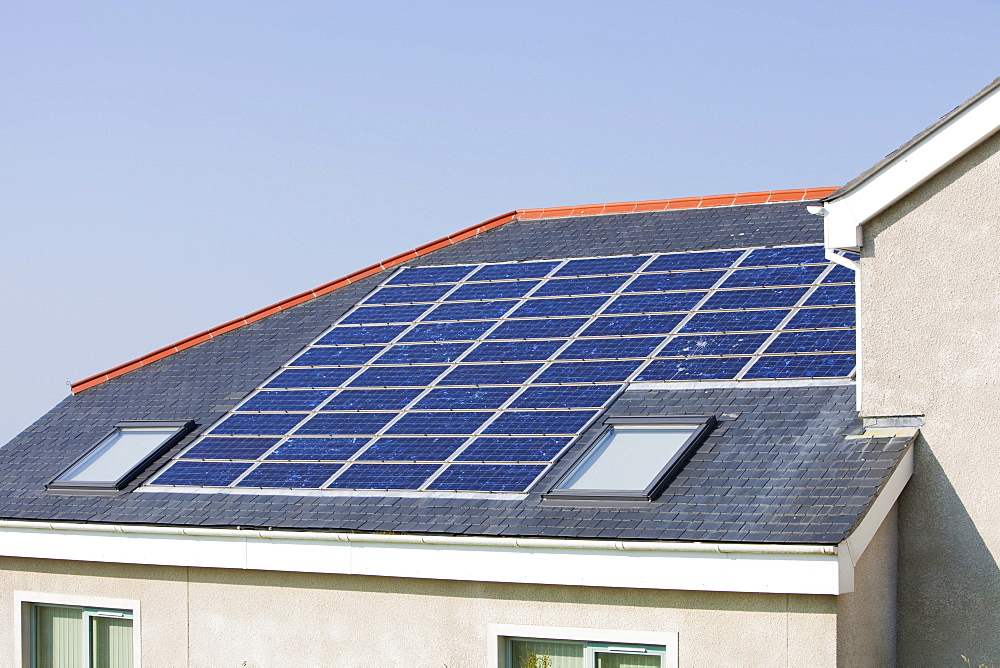 Solar electric panels on a school roof in Pendeen, Cornwall, England, United Kingdom, Europe