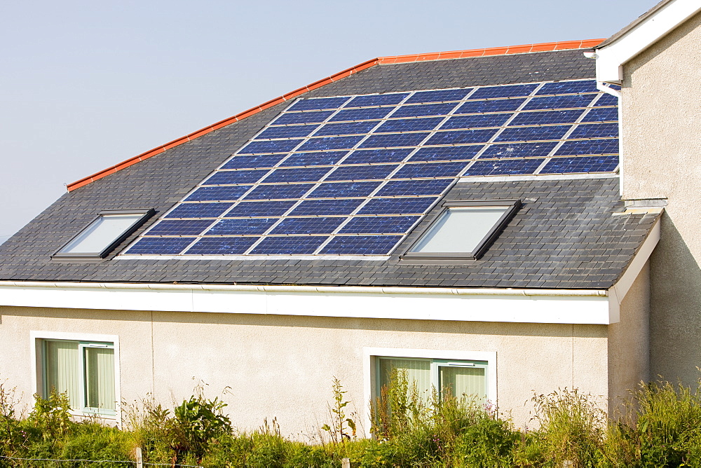 Solar electric panels on a school roof in Pendeen, Cornwall, England, United Kingdom, Europe