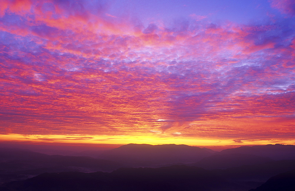 Sunset over the Coniston Fells in the Lake District National Park, Cumbria, England, United Kingdom, Europe