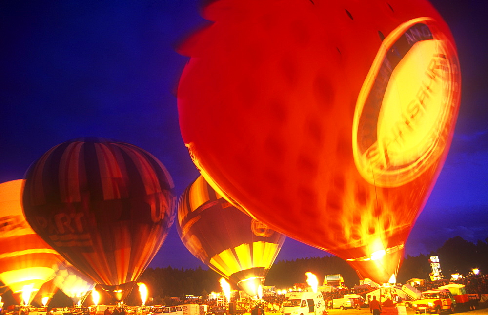 Hot air balloons preparing to take off at dusk, Huddersfield, Yorkshire, England, United Kingdom, Europe